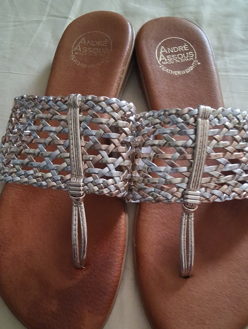 Fancy Andre Assous Silver Woven Thong Sandals on Brown Footbed